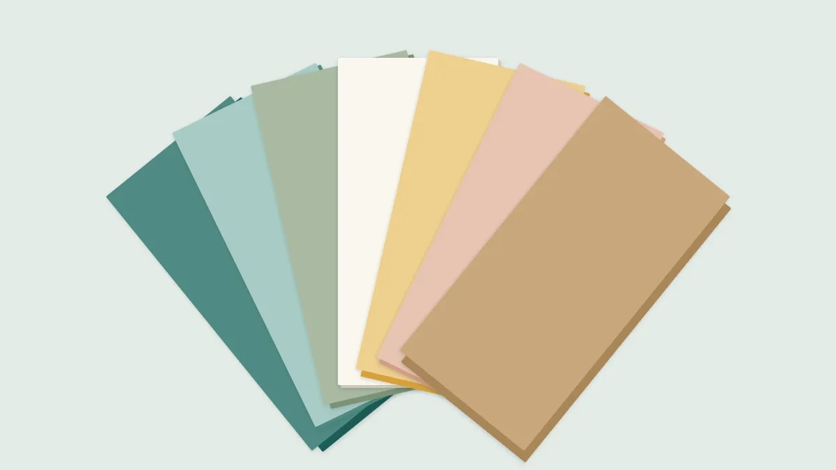 A fan of paper sheets in different colors and thicknesses