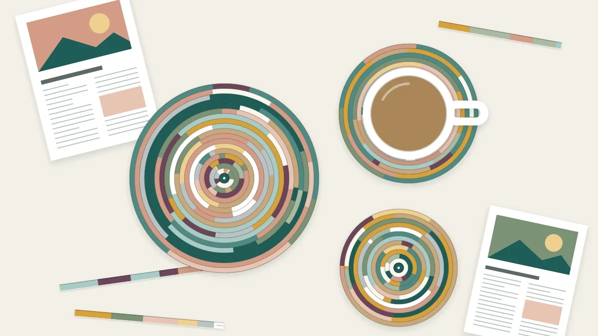 Round coasters made from tightly coiled strips of folded magazine pages