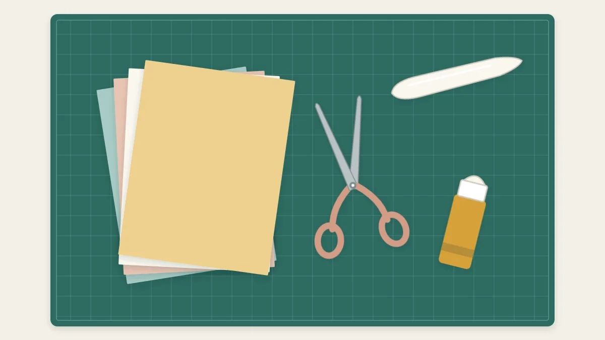 Starter kit for paper crafts: a small stack of colored cardstock, scissors, a glue stick and a bone folder on a cutting mat