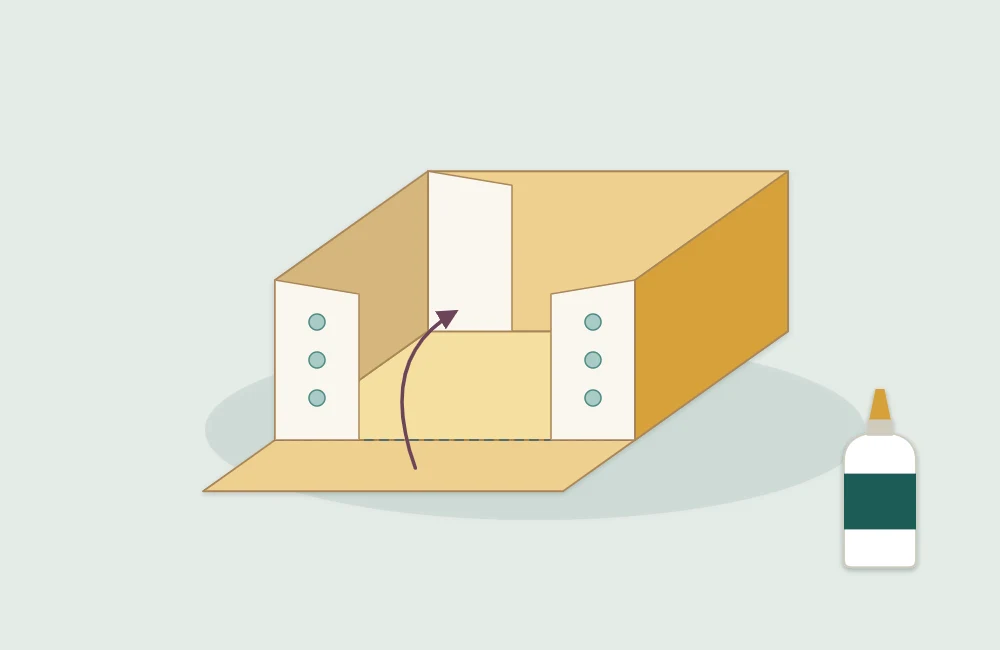 Box base with walls folded up and the corner tabs glued against the inside of the adjoining walls