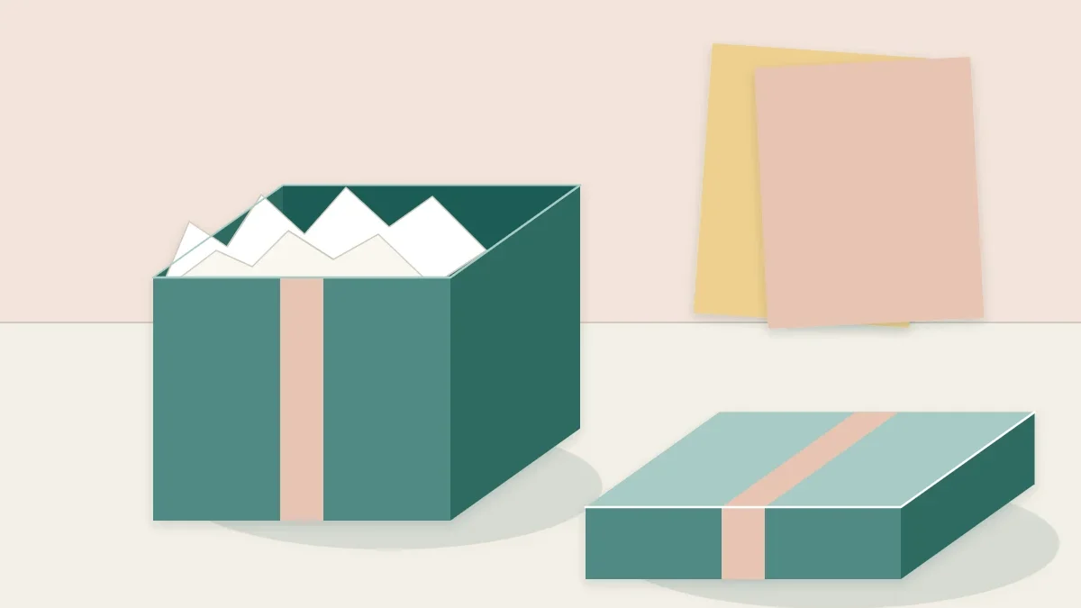 A square cardstock gift box with its lid resting beside it