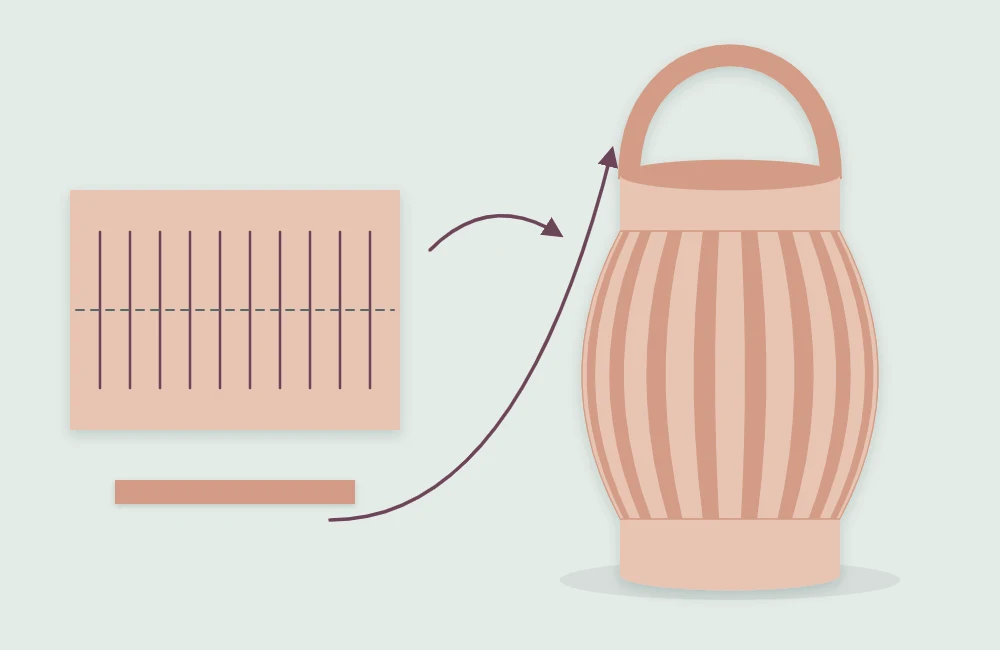 Slit sheet opened flat and rolled into a cylinder with a narrow handle strip attached across the top