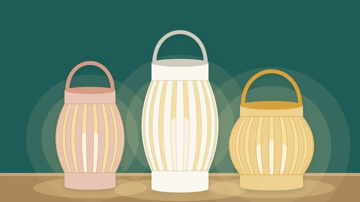 Three cut-paper cylinder lanterns glowing softly from battery LED lights inside