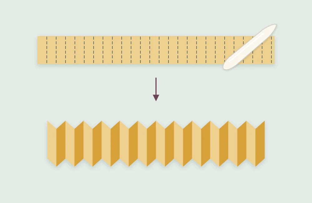 Long paper strip with evenly spaced accordion folds