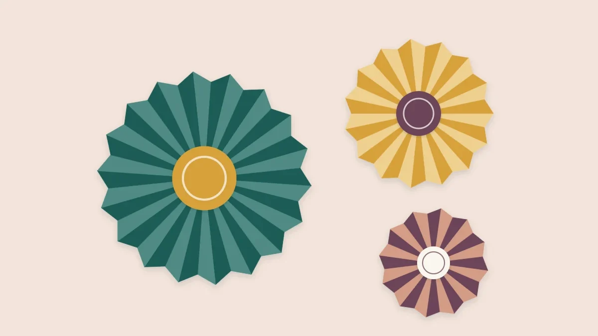 Three pleated paper rosettes in different sizes and colors