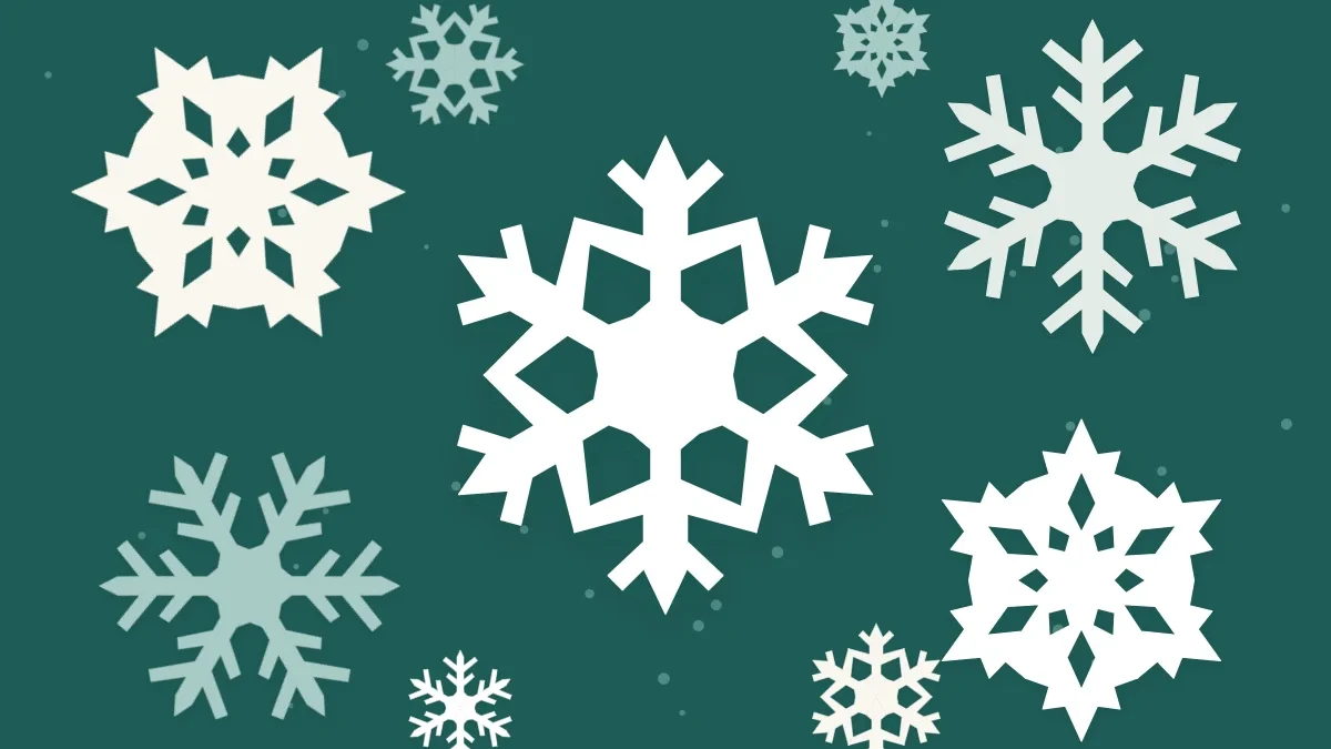 Several white six-point paper snowflakes of different sizes on a deep teal background