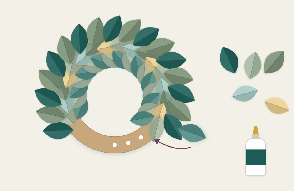 Cardboard ring partly covered with overlapping paper leaves, with bare cardboard still visible on one side