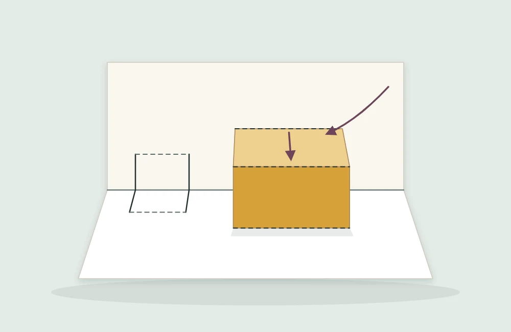 An open card with the cut tab pushed inward so that it stands as a small box