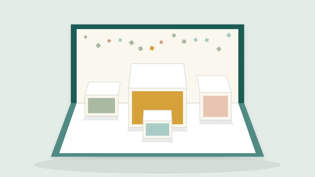 Open handmade card with three box pop-ups standing at different heights